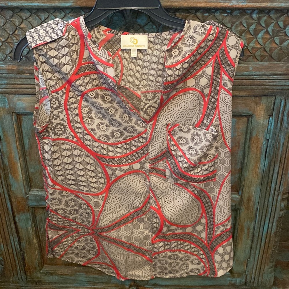 Sleeveless patterned blouse red and tan color. Size XS